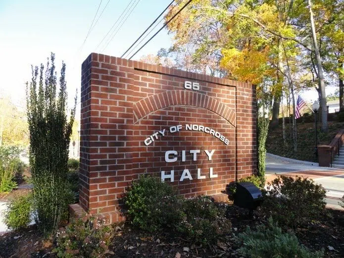 data-src="https://www.mainlineatl.com/wp-content/uploads/2021/05/norcross-city-hall-1.jpg"